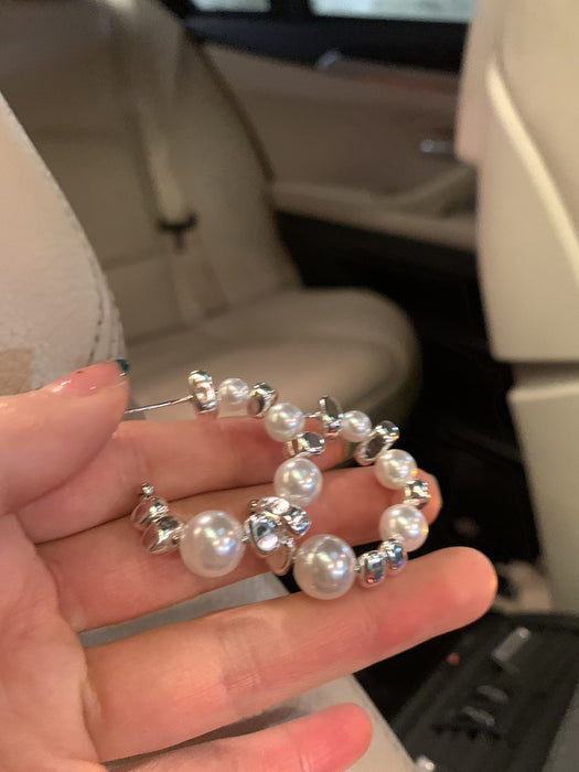 Elegant women's pearl stud earrings with exquisite design and unique style