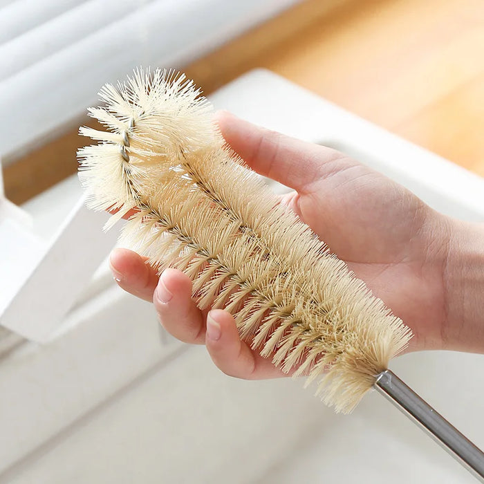 A long-handled cleaning brush for bottles, cups, etc