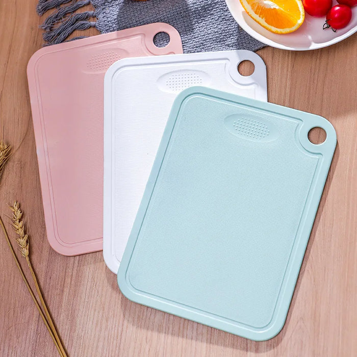 Durable plastic cutting board with polka dots