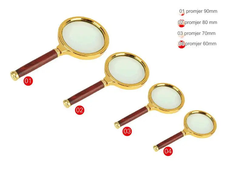 Elegant gold handle magnifying glass for reading newspapers