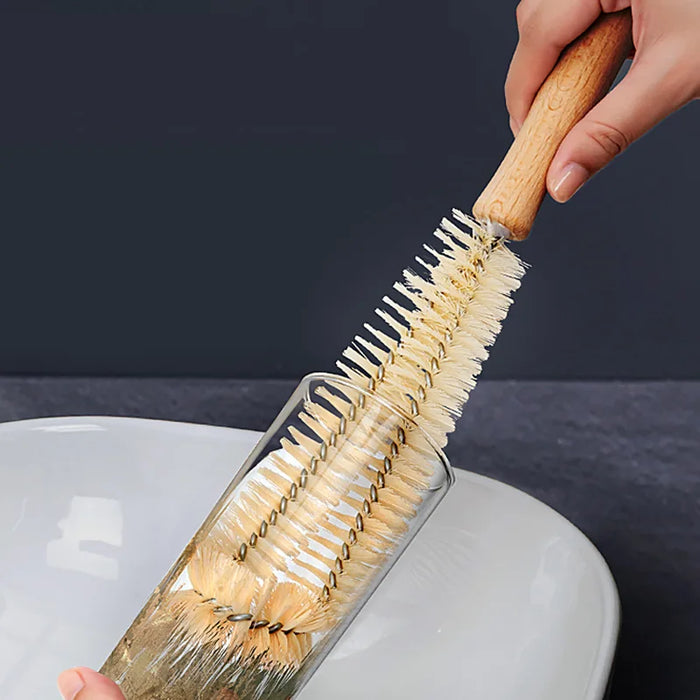 A long-handled cleaning brush for bottles, cups, etc