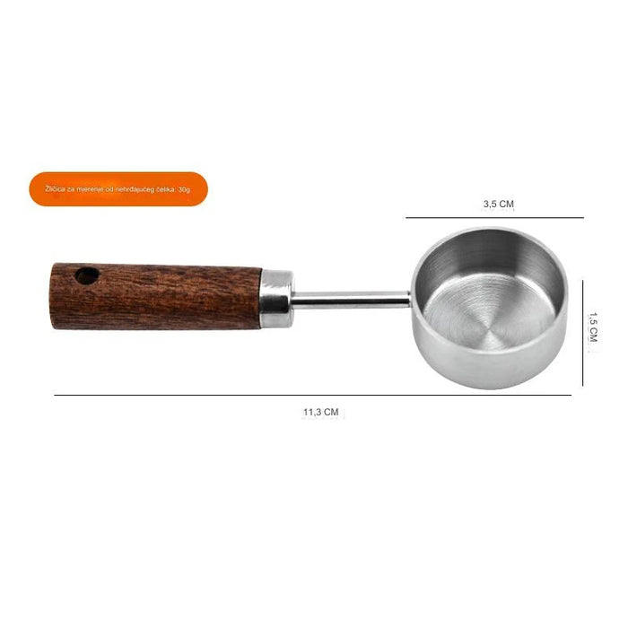 Stainless steel measuring spoon with wooden handle