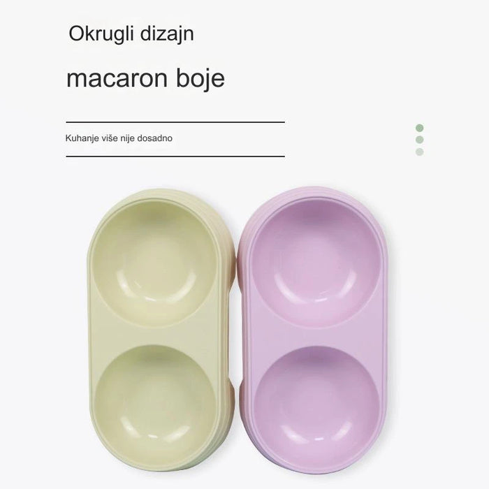 Round plastic pet food bowl with two bowls