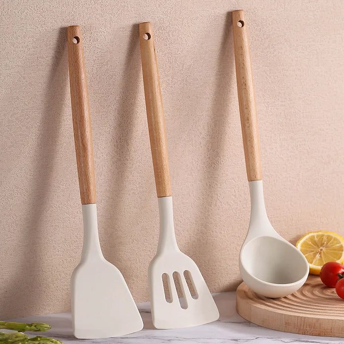 Premium cooking tools with wooden handles and non-stick pans