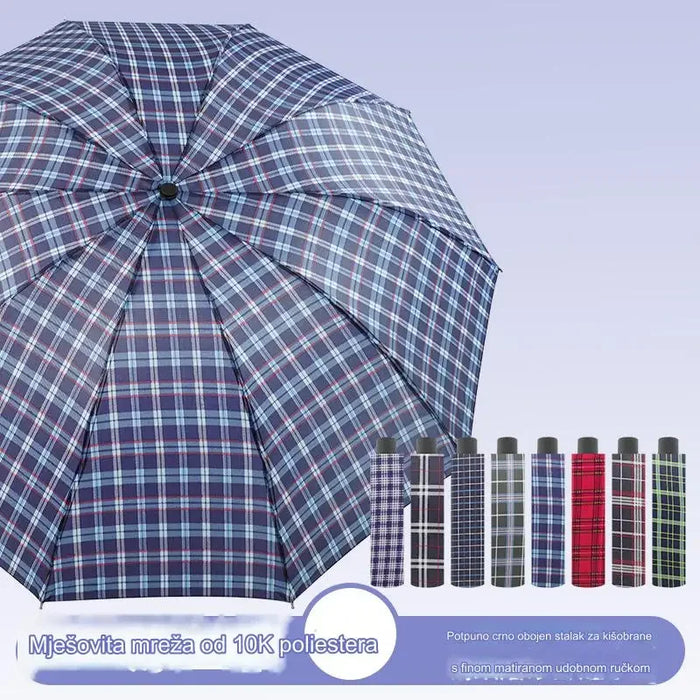 Holding a large plaid umbrella