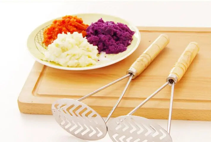 Potato masher and juicer, stainless steel fruit and vegetable press