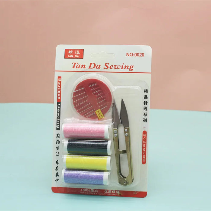 Complete sewing with scissors, needle, thread, and a sewing machine