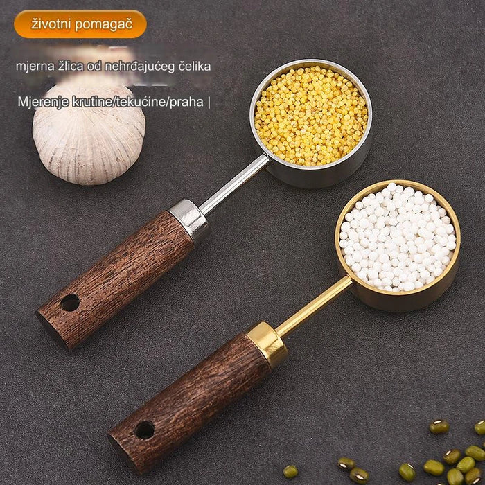 Stainless steel measuring spoon with wooden handle