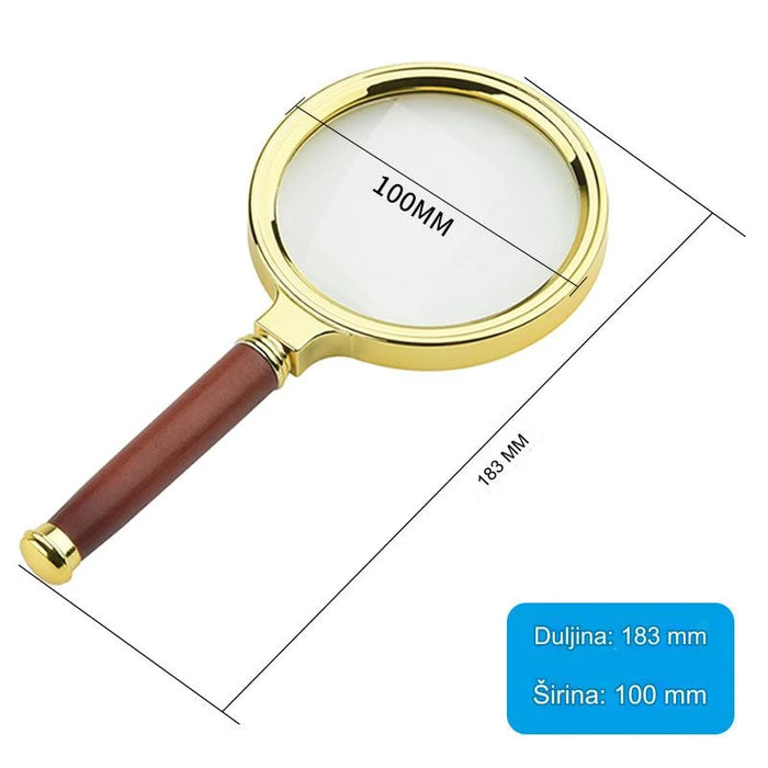 Elegant gold handle magnifying glass for reading newspapers