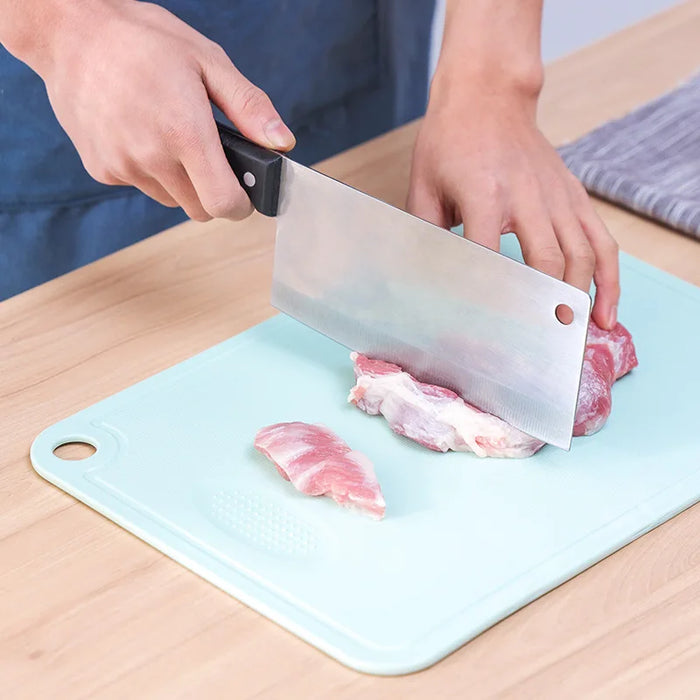 Durable plastic cutting board with polka dots