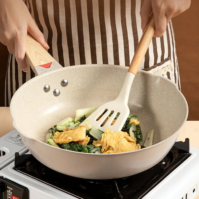 Premium cooking tools with wooden handles and non-stick pans